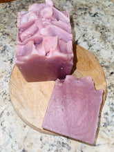 Load image into Gallery viewer, Noureture By Nature’s Just Lavender Handmade Soap. Handmade Vegan Soap. Organic Ingredients Soap. All-Natural Handmade Soap. Cruelty Free Ingredients Soap. Small Business Soap. Black Women in Business Soap. Handmade Soap on circular wooden board, placed on top of kitchen counter. Nigerian Shea Butter Handmade Soap.
